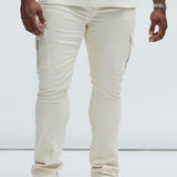 Impacientes jeans de carga acampanados y ajustados con bordados - blanco hueso