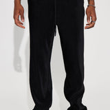 Pantalones Slim con Textura y Aberturas - Negro