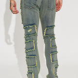 Jeans ajustados acampanados apilados deshilachados - Tono azul vintage