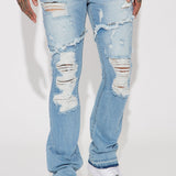 Atrapada en el ciclo de jeans ajustados con bota - Lavado azul claro