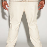 Pantalones de piel sintética de alta gama con corte acampanado - Crema