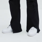 Pantalón de Mezclilla Acampanado Slide Home Distressed Slim Stacked - Negro
