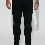 Pantalón De Mezclilla Jasper Skinny Ripped Knee - Negro