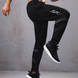 Manfinity Fitness Pantalones deportivos con estampado de letra