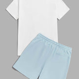 Manfinity Chillmode Hombres Shorts con top algodon con letra con con estampado tropical