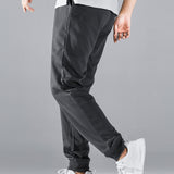 Manfinity Basics Pantalones deportivos con bolsillo oblicuo de cintura con cordon