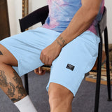 Manfinity Homme Hombres Shorts deportivos con estampado de letra con cordon