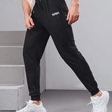 Manfinity Fitness Hombres Pantalones deportivos con estampado de letra con cordon