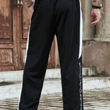 Manfinity Hypemode Pantalon De Chandal Para Hombres Con Graficos De Letras, Costuras Laterales Contrastantes Y Cintura Con Cordon