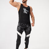 Manfinity Fitness Hombres Pantalones deportivos con estampado de slogan reflectante 2 en 1 con bolsillo para telefono