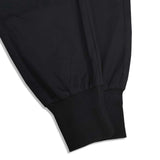 Manfinity EMRG Hombres Pantalones sueltos de carga con bolsillo de solapa, detalle de hebilla, cintura con cordon y largo largo, color negro liso, ideal para salir o musicos de rap