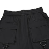 Manfinity EMRG Hombres Pantalones sueltos de carga con bolsillo de solapa, detalle de hebilla, cintura con cordon y largo largo, color negro liso, ideal para salir o musicos de rap