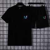 Manfinity Hypemode Hombres Shorts con camiseta reflectante con estampado de expresion