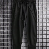Manfinity Homme Pantalones Deportivos Holgados De Color Solido Para Hombres Con Cintura Con Cordon