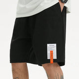 Manfinity EMRG Hombres Shorts con estampado de slogan de cintura con cordon