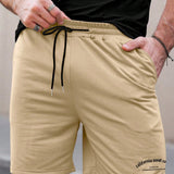 Manfinity Homme Hombres con estampado de slogan Camiseta & de cintura con cordon Shorts