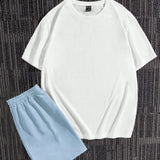 Manfinity Hypemode Hombres Camiseta con estampado de slogan y dibujos animados & Shorts de cintura con cordon