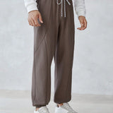 Manfinity Homme Hombres Pantalones deportivos de cintura con cordon con costura detalle de cintura con cordon