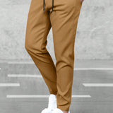 Manfinity Basics Hombres Pantalones unicolor con bolsillo oblicuo de cintura con cordon