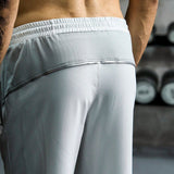 Manfinity Sport Corelite Hombres Pantalones deportivos con bolsillo con cremallera de cintura con cordon