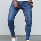 Manfinity Homme Jeans ajustados lavados largos para hombre, de color azul plano y estilo basico de trabajo de carga, esposo