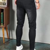 Manfinity Homme Hombres Jeans ajustados con bolsillo oblicuo