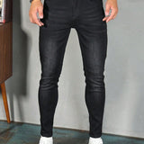 Manfinity Homme Hombres Jeans ajustados con bolsillo oblicuo