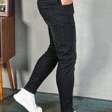 Manfinity Homme Hombres Jeans ajustados con bolsillo oblicuo