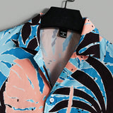 Manfinity Chillmode Conjunto De Camisa De Manga Corta Con Estampado Tropical Y Pantalones Cortos De Color Liso Para Hombre