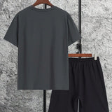 Conjunto De Camiseta Y Pantalones Cortos De Manga Corta Con Bloques De Color Para Hombre