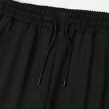 Pantalones deportivos masculinos de punto con cintura elastica ajustable y cordon, con parches y letras estampadas
