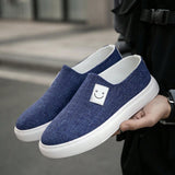 Zapatos deportivos informales de lona azul para hombre con estilo simple, comodos y transpirables con patron de payaso.