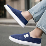 Zapatos deportivos informales de lona azul para hombre con estilo simple, comodos y transpirables con patron de payaso.