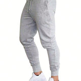 Hombres nuevos pantalones deportivos casuales de jogging elasticos de fitness con pierna conica