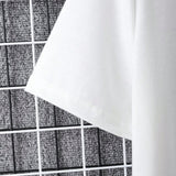 Conjunto De Camiseta De Manga Corta Y Pantalon Corto Para Hombre Con Diseno Moderno Y Casual De Bloques De Color En Blanco Y Negro Y Letras Impresas