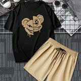 Manfinity EMRG Conjunto De Camiseta Y Shorts Con Dibujos Animados Para Hombres