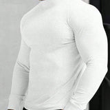 Camiseta de manga larga con cuello simulado y dobladillo redondeado para hombres en primavera
