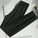 Pantalones deportivos de verano para hombres, de seda de hielo delgada y recta, transpirables, de secado rapido, elasticos y adecuados para entrenamiento