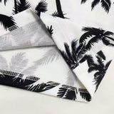 Conjunto de camiseta de manga corta y pantalones cortos con estampado tropical para hombre
