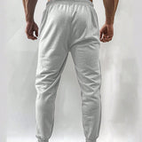 Manfinity Sport Corelite Pantalones deportivos informales de cordon impresos de moda para hombres