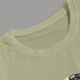 Manfinity LEGND Conjunto de dos piezas para hombre con camiseta de cuello redondo de manga corta con estampado de caricatura y pantalones cortos con cordon y bolsillo