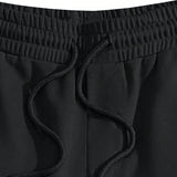 Manfinity EMRG Pantalones de chandal casuales para hombres con cintura con cordon y estampado de cruz y letras