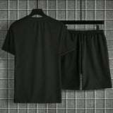 Conjunto para hombre de verano con camiseta casual de manga corta con estampado de letras coloridas y cuello redondo, y pantalon corto