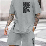Manfinity Homme Conjunto holgado para hombres con camiseta grafica con eslogan y pantalones cortos de cintura con cordon