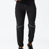 Manfinity Running Pantalones de chandal para hombre con estampado geometrico, cintura con cordon y bolsillos