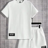 Manfinity Homme Conjunto de camiseta de manga corta tejida y pantalones cortos para hombre