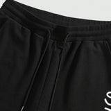 Manfinity Chillmode Conjunto de camiseta casual de manga corta y pantalones cortos impresos con letra de palmeras para hombres en verano