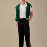 Manfinity AthPrep Hombres Pantalones de chandal conicos con cintura elastica con cordon y franjas en bloques de color