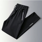 Pantalones atleticos tejidos para hombres, nuevos pantalones de verano estilo holgado y transpirables para entrenamiento de fitness y carrera