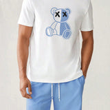 Manfinity Hypemode Conjunto de camiseta y pantalon corto de manga corta de cuello redondo y ajuste holgado con estampado de oso de dibujos animados para hombres en verano